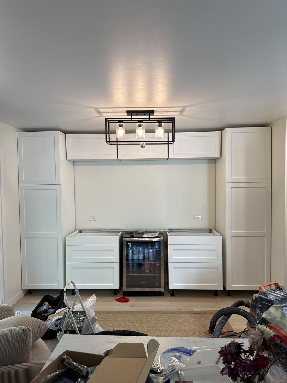 Cabinets and beverage fridge installed