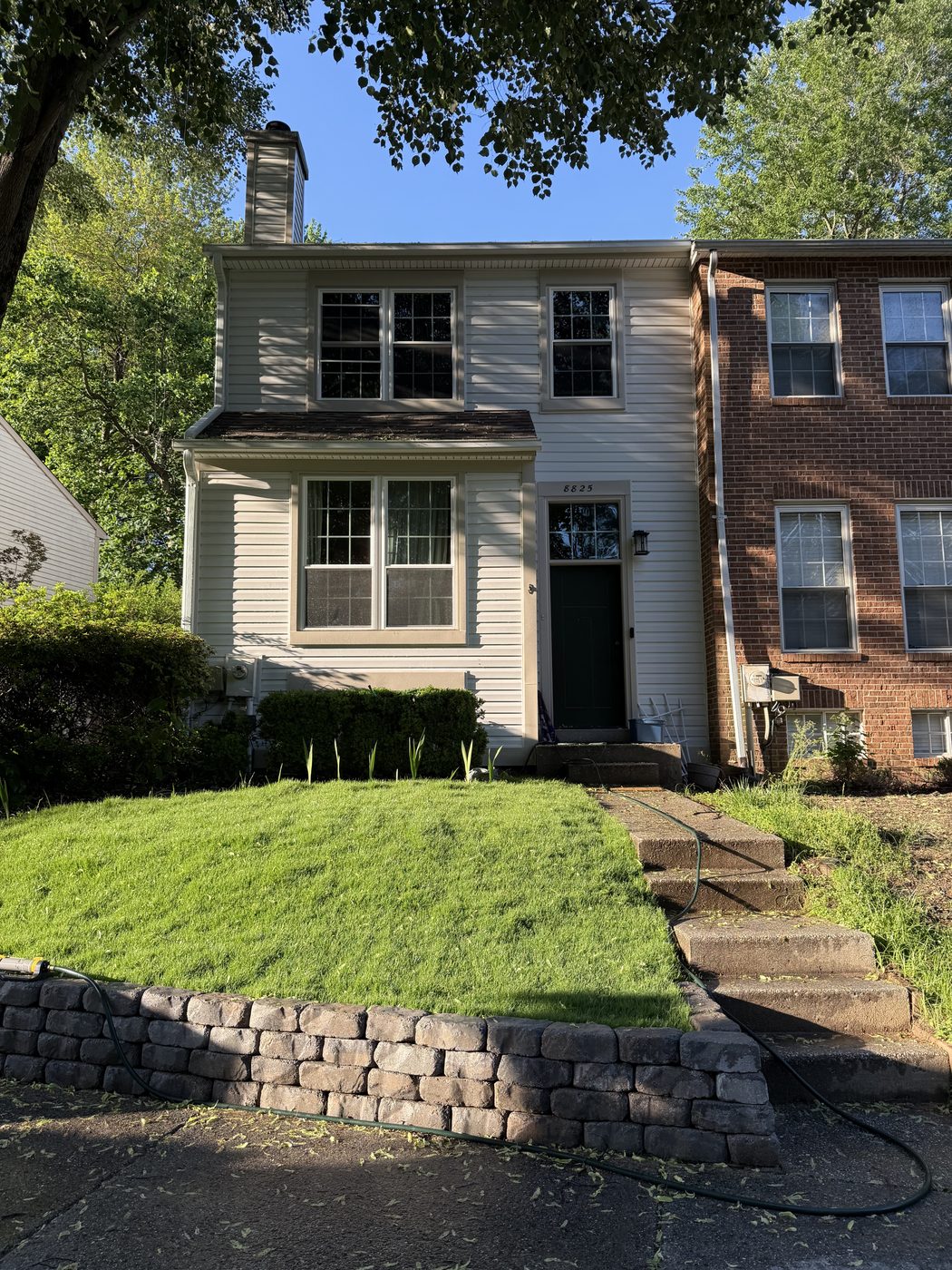 Full front view of finished wall and lawn